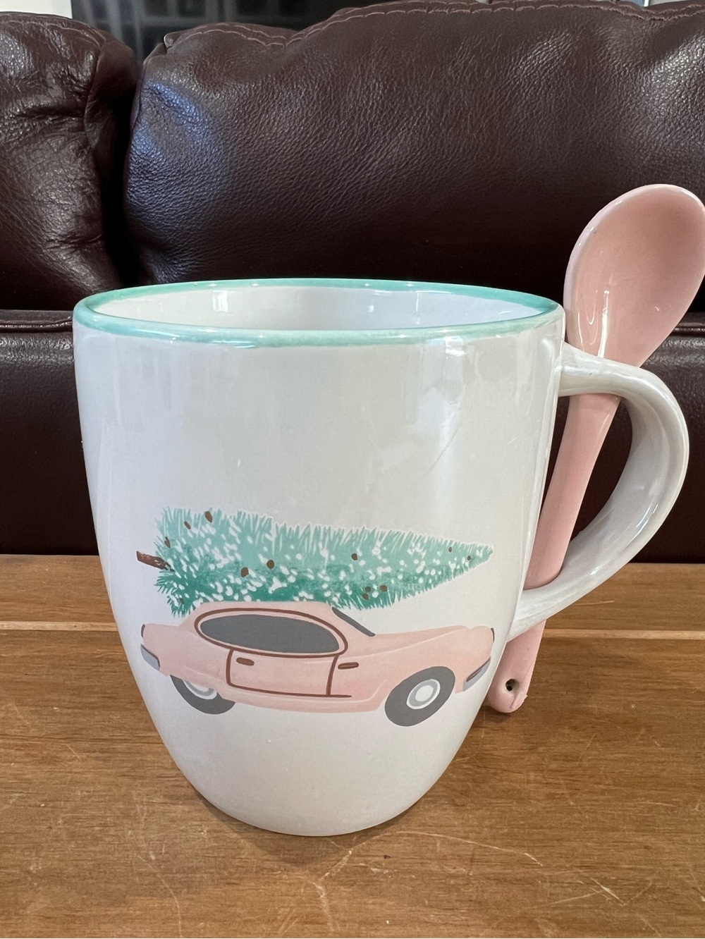 White mug with pink car and Christmas tree design LC Lauren Conrad. 13oz.